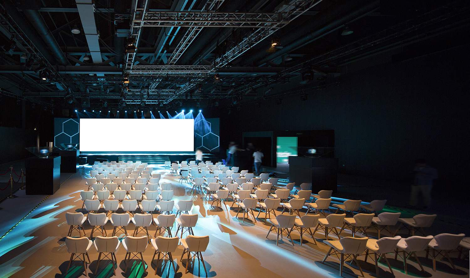 Super,Conference,Hall,With,White,Chairs,And,Colored,Illumination,And